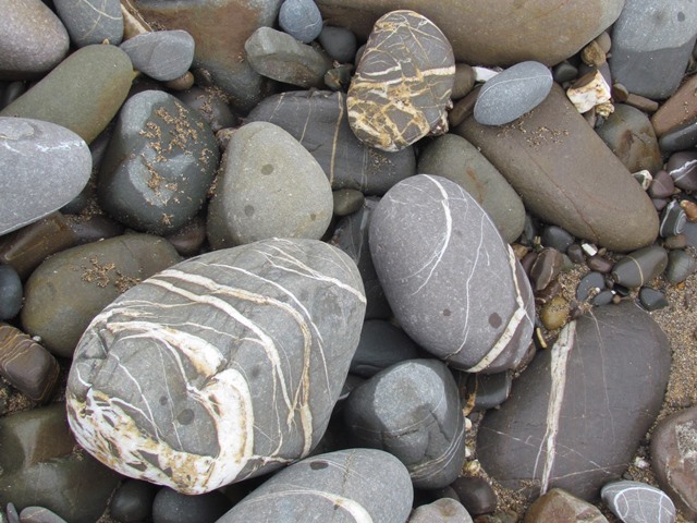 Striped pebbles on Widemouth beach 